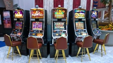 Slot game interface showing Aviator and Sweet Bonanza titles